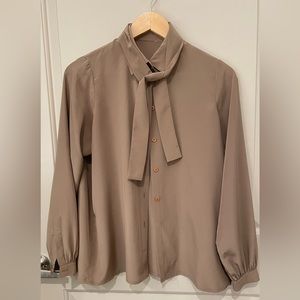 Women’s button-up bow blouse